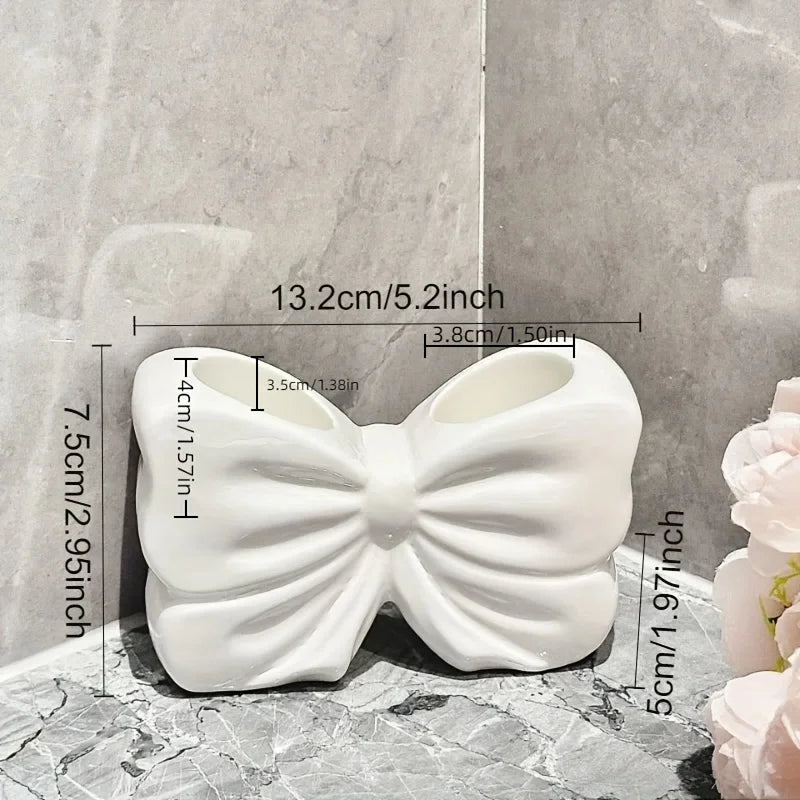 BowTique Brush Holder - Charming ceramic bow toothbrush holder - Portable, bathroom storage for toothbrushes and toothpaste