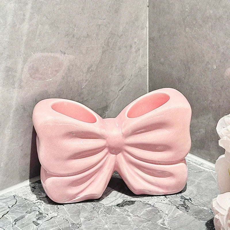 BowTique Brush Holder - Charming ceramic bow toothbrush holder - Portable, bathroom storage for toothbrushes and toothpaste