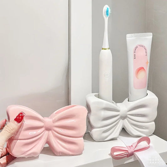 BowTique Brush Holder - Charming ceramic bow toothbrush holder - Portable, bathroom storage for toothbrushes and toothpaste